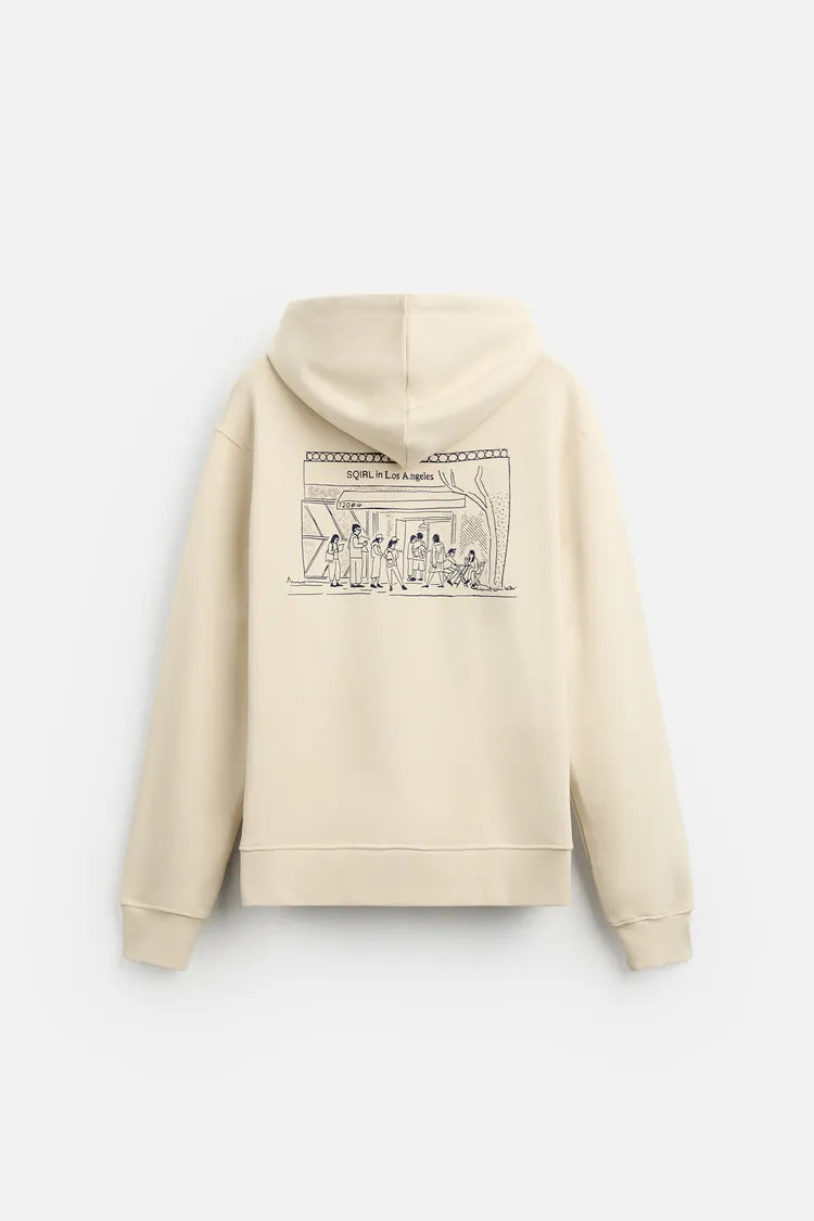 SUDADERA CON CAPUCHA GRÁFICA SQIRL