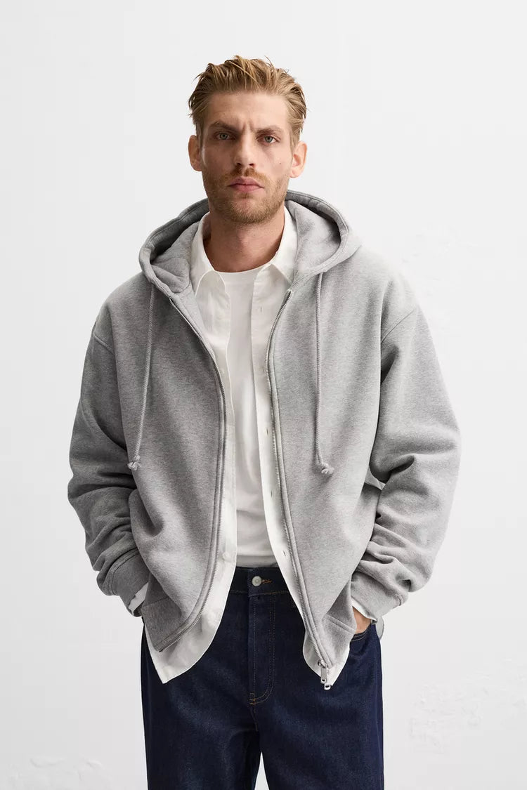 sudadera gris jaspeada