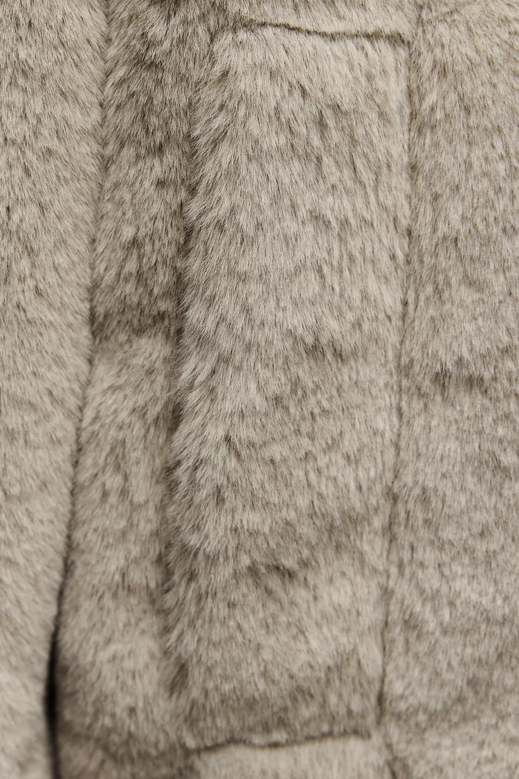 MANTEAU DE PELUCHE FAUX